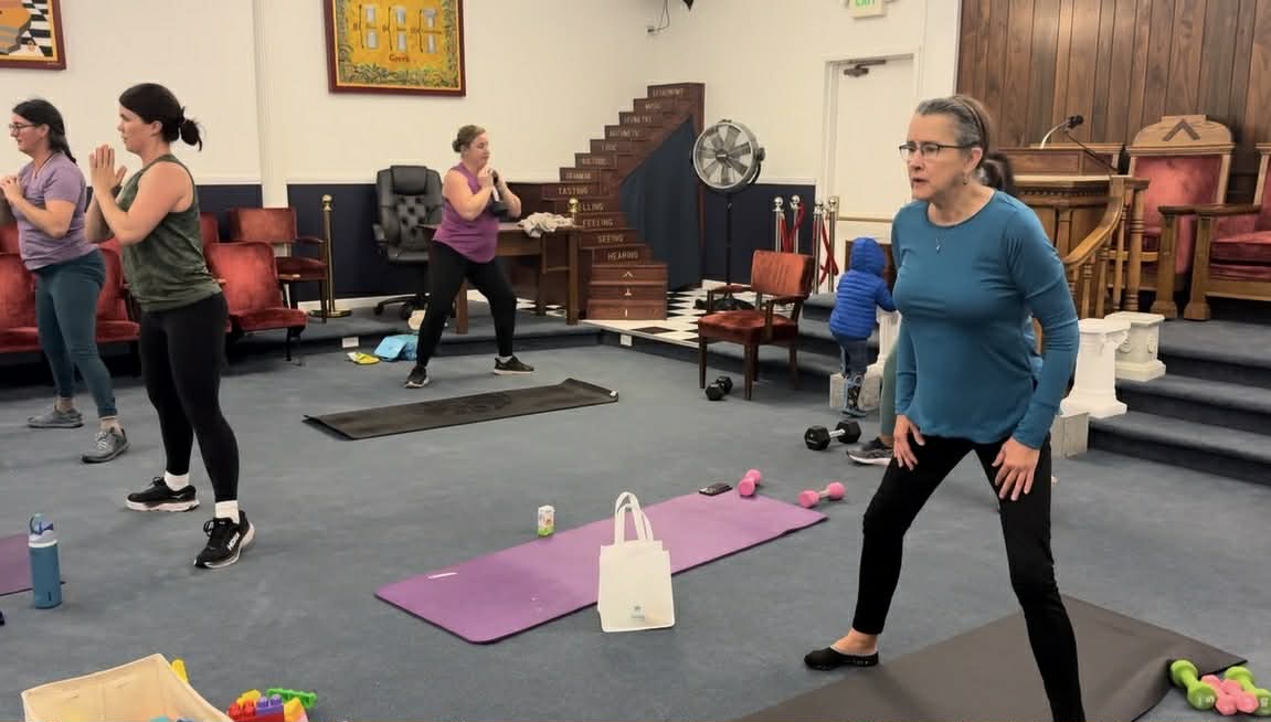 Class members of various ages working out together