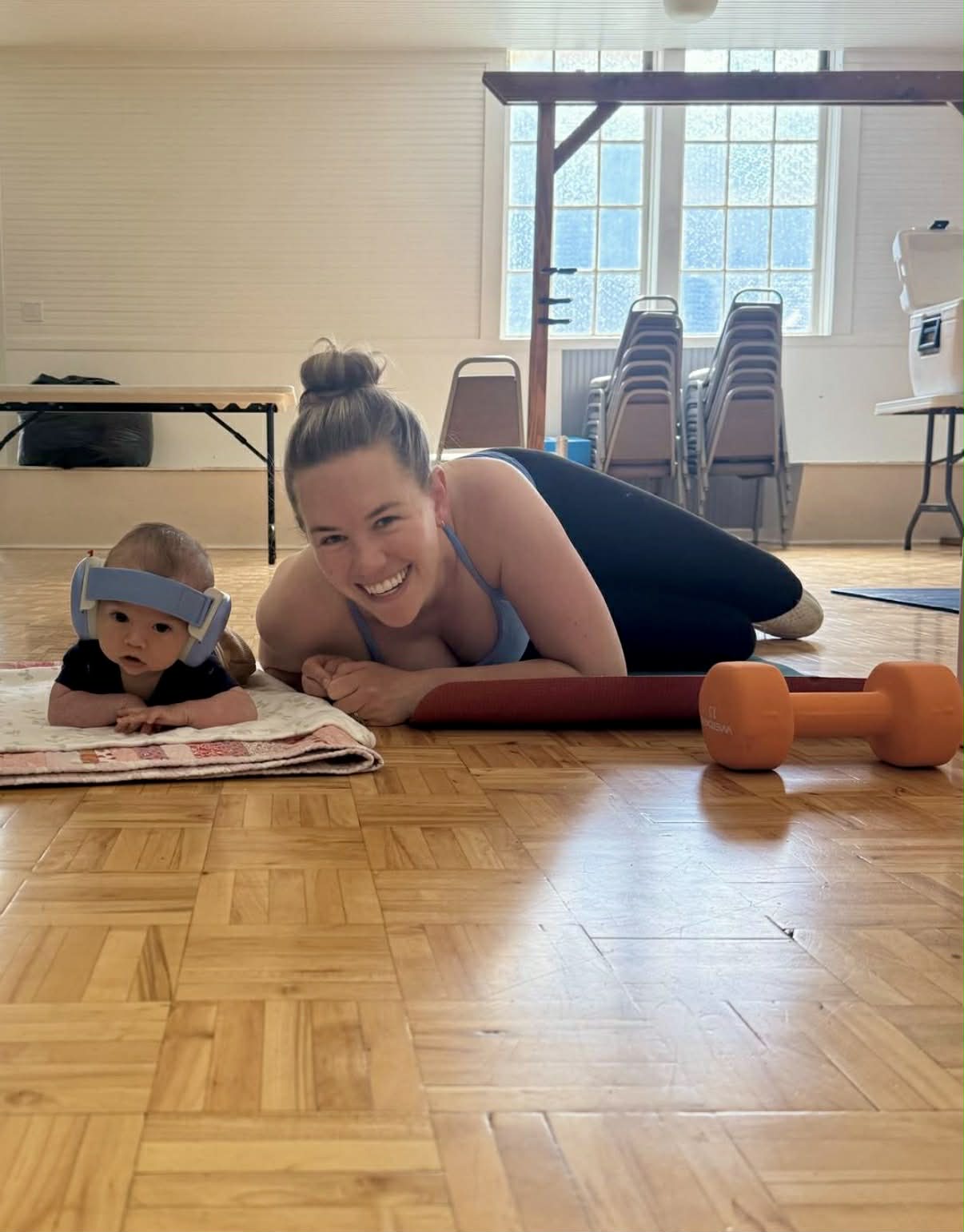 Mom and baby doing tummy time together during class